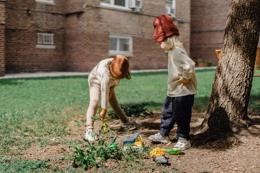 two children playing in the garden